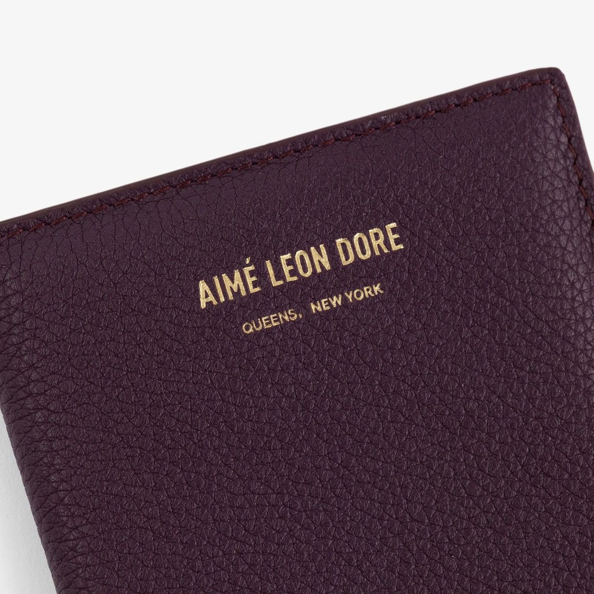 aime leon dore passport holder