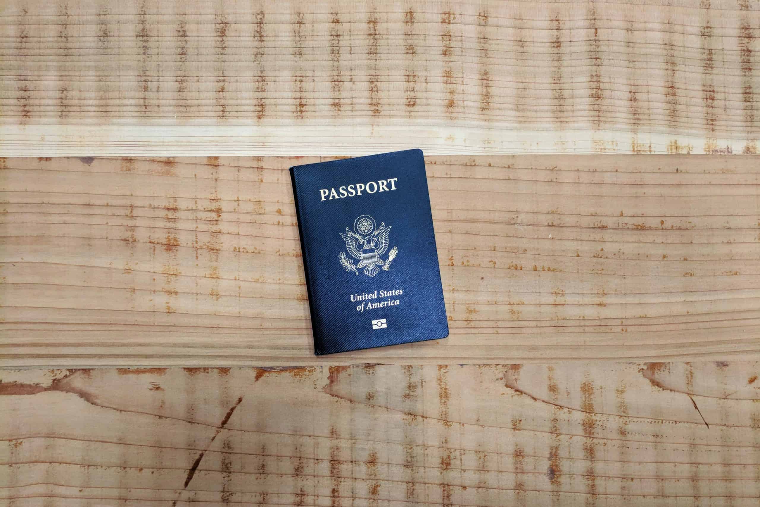 can i travel on a passport in my maiden name