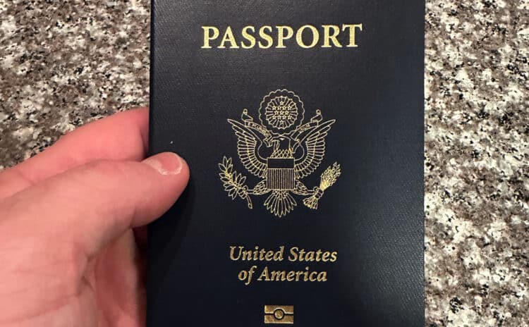 can i travel on maiden name passport