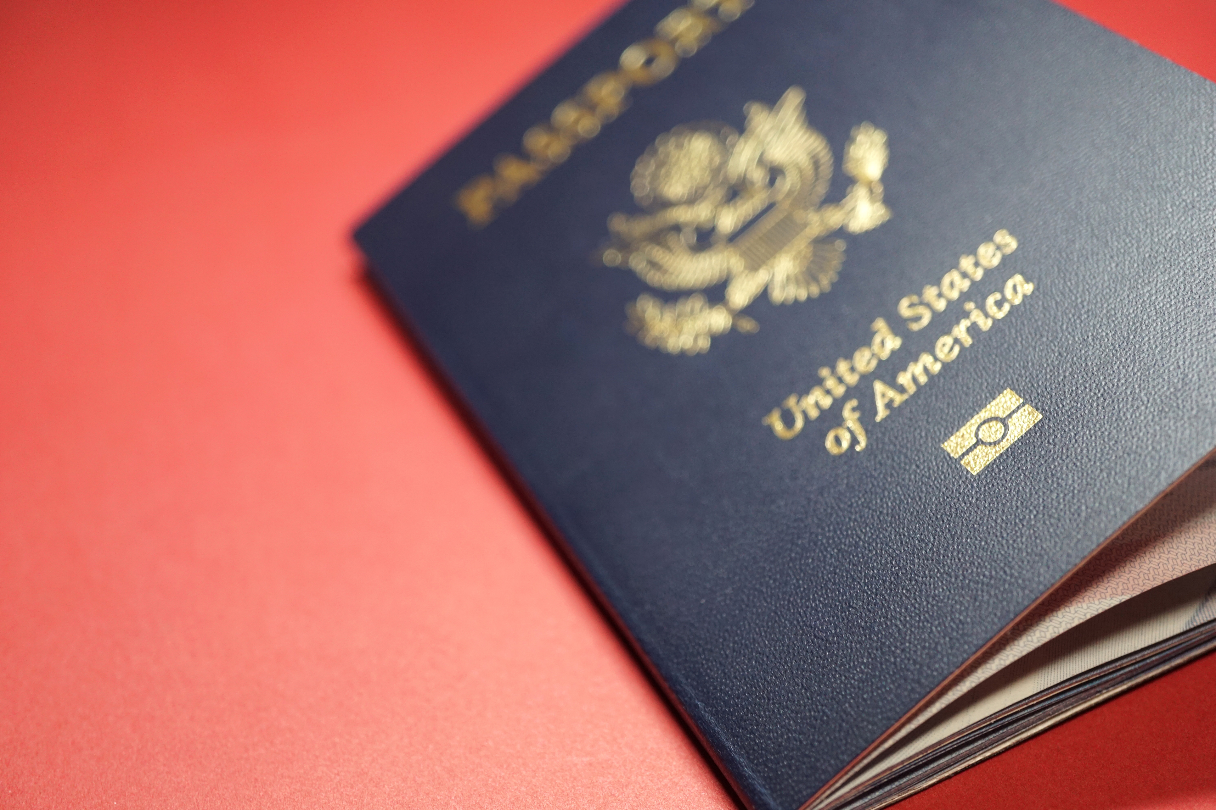 can i travel on my old passport after getting married