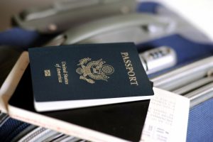 can you obtain a passport with a warrant