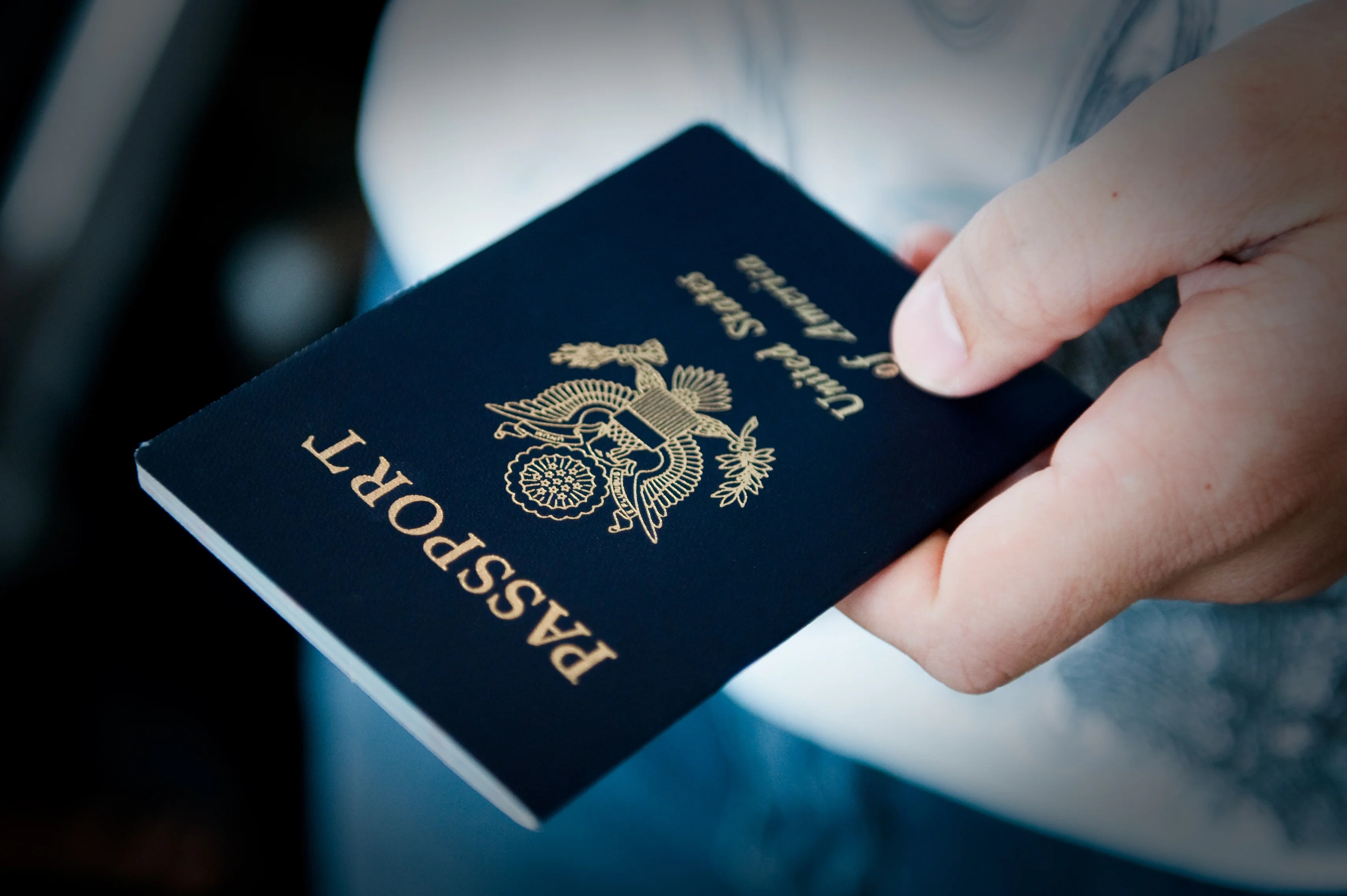 can you travel on your maiden name passport