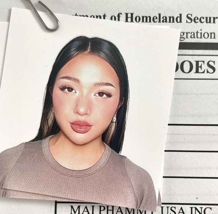 earrings on passport photos