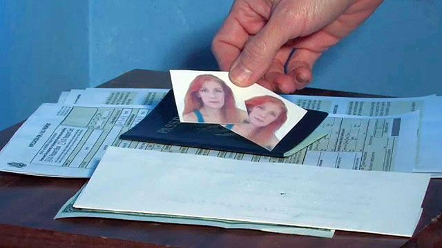 how to staple passport photo to application