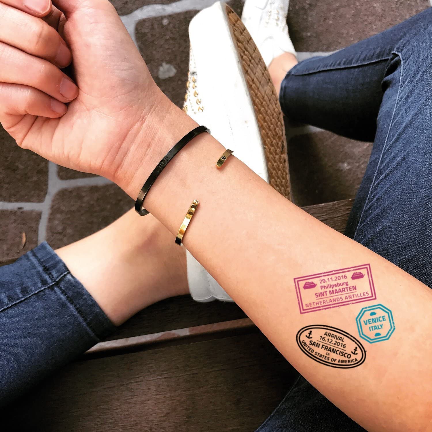 passport stamp tattoo