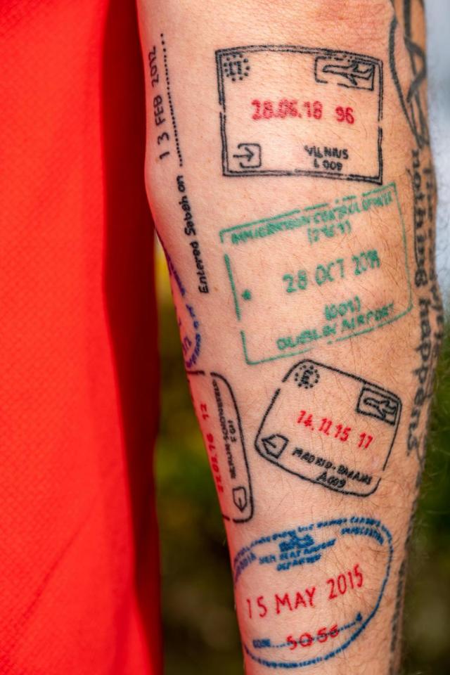 passport stamp tattoo