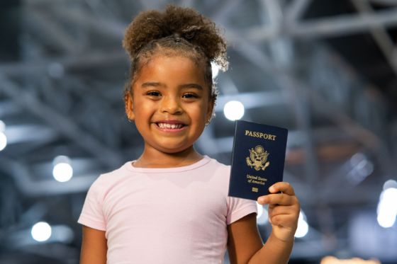 who signs a child's passport